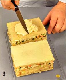 Бутербродный торт с сельдью и крабовыми палочками